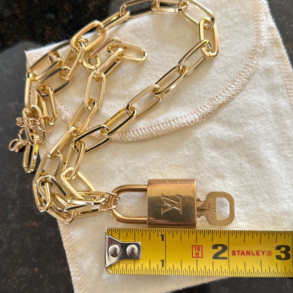 Authentic Louis Vuitton Lock & Key with Gold Tone Chain Necklace - Picture 12 of 13